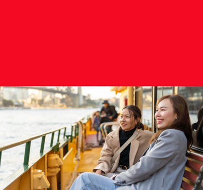 Two women sitting and looking at the horizon