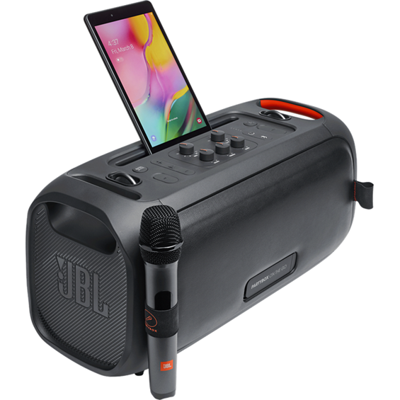 Side angle view of JBL Party Box On-The-Go with microphone, showing a mobile phone.