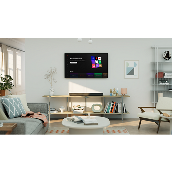 Photo of a TV above a Stream TV Soundbar in a living room