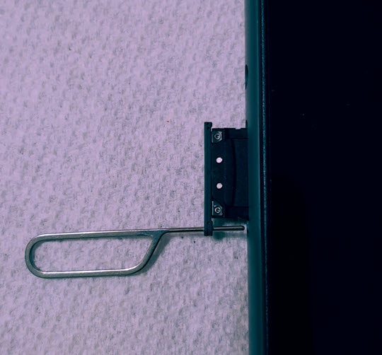 Remove SIM card tray
